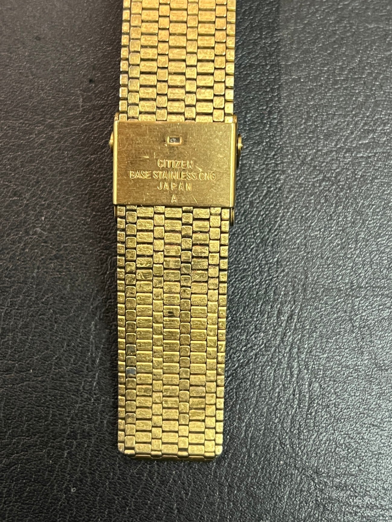 Citizen Seven Quartz Armbanduhr Day Date goldfarben Milanaise