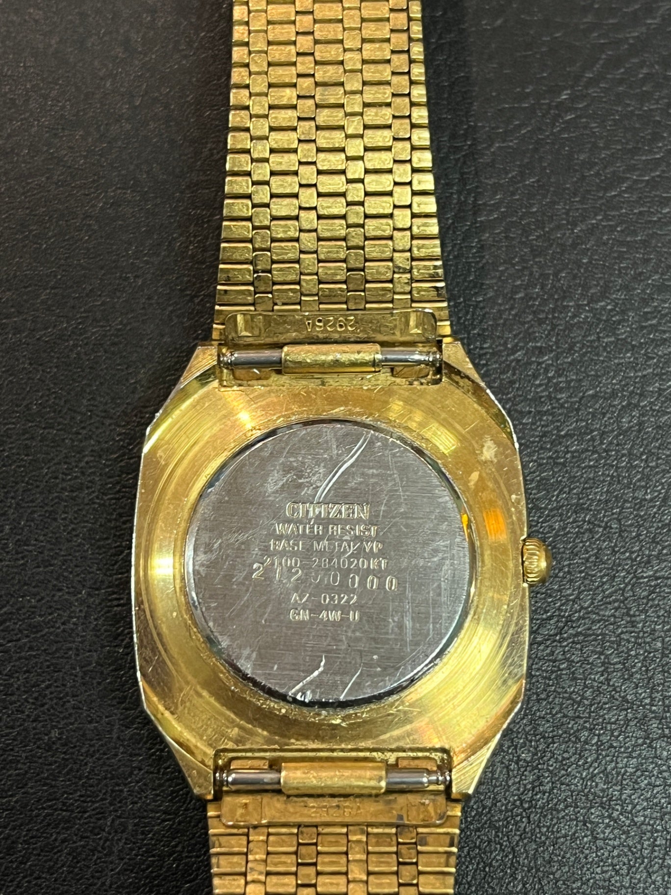 Citizen Seven Quartz Armbanduhr Day Date goldfarben Milanaise